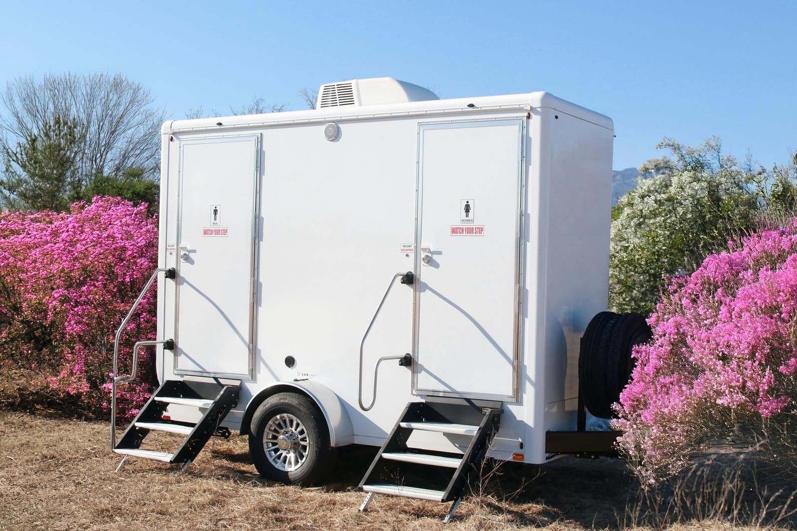 luxury restroom trailer  portable bathroom rental  upscale event restrooms  wedding restroom trailer  3-stall or 2-stall restroom  climate-controlled trailer  mobile restroom unit  Potomac Event Rentals  Virginia event rentals  outdoor event bathroom